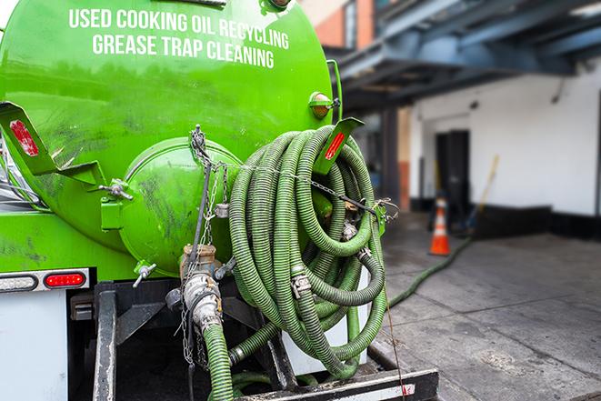 a grease trap pumping truck at a restaurant in Morongo Valley